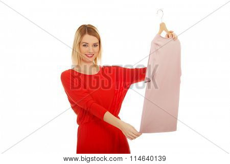 Woman thinking what to wear.