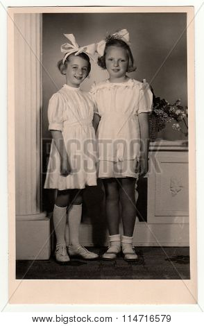 A vintage photo of the young girls - the first holy