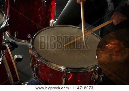 Drummer playing the drums closeup