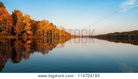 Warm September evening after a likewise day on a Northern Ontario lake as seen from a canoe.