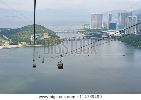 HONG KONG - MAY 11, 2012: view from Ngong Ping 360 cable car. The Ngong Ping 360 is a tourism project on Lantau Island in Hong Kong.