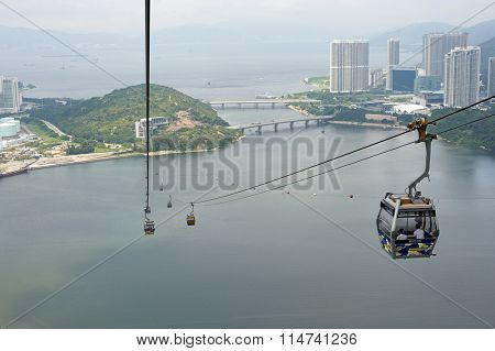 HONG KONG - MAY 11, 2012: view from Ngong Ping 360 cable car. The Ngong Ping 360 is a tourism project on Lantau Island in Hong Kong.