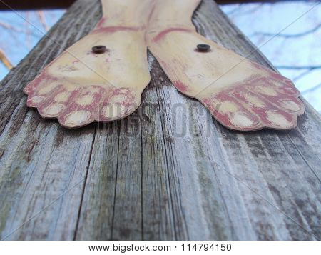 Detail of crucified feet of Jesus Christ
