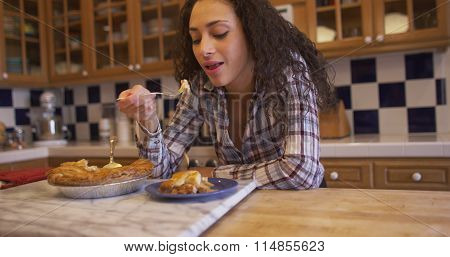 Beautiful Latino Brunette Woman Tasting Apple Pie