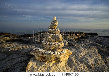 Pyramid Of Stones By The Sea