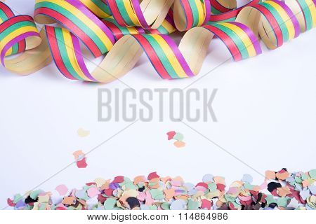 Streamers And Confetti For Carnival On White Background