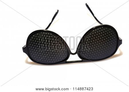 Super COOL Black Plastic Pinhole Sunglasses, isolated on white with room for your text.
Black Sunglasses are worn by cool people around the world.