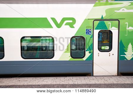 HELSINKI, FINLAND - SEPTEMBER 21, 2014: train at Helsinki Central railway station. It is a widely recognised landmark in Kluuvi, part of central Helsinki, Finland