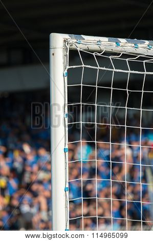 Goal Post With Soccer Fans In The Background