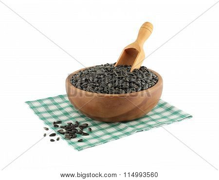 Wooden bowl full of Sunflower seeds