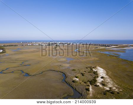 Aerial view of beach front homes and island on the South Carolina coast.