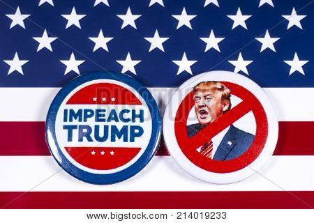 LONDON UK - NOVEMBER 15TH 2017: Anti-Tump badges over an American flag background on 15th November 2017.