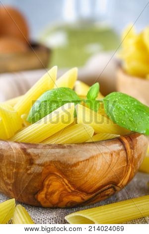 Penne Rigate. Macaroni In The Form Of Feathers. Mostaccioli Pasta.