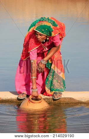 Khichan, India - February 12: An Unidentified Woman Gets Water From Reservoir On February 12, 2011 I