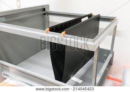 Hanging Black File Folder In Cabinet Drawer.