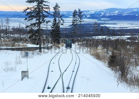 View of the funicular railway at High Tatras mountains National park in Slovakia. Railroad leads to popular ski and tourist resort Hrebienok (altitude 1285 m.) from Stary Smokovec village.