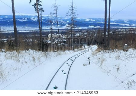 View of the funicular railway at High Tatras mountains National park in Slovakia. Railroad leads to popular ski and tourist resort Hrebienok (altitude 1285 m.) from Stary Smokovec village.