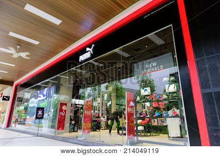 Penang Malaysia - Nov 11 2017: Puma shop. PUMA SE branded as PUMA is a German multinational company that designs and manufactures athletic and casual footwear apparel and accessories headquartered in Herzogenaurach Bavaria.