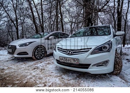 ROSTOV-ON-DON, RUSSIA- CIRCA DECEMBER 2016: Hyundai i40 and Hyundai Solaris outside on winter day