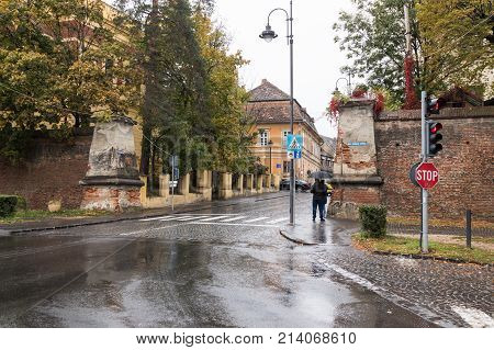 Sibiu Romania October 07 2017 : The passage in the city fortress wall on the Boulevard Corneliu Coposu in a rainy day. Sibiu city in Romania