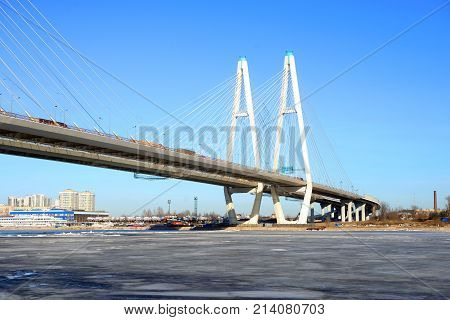 Cable stayed bridge on the outskirts of St. Petersburg at sunny winter day Russia.
