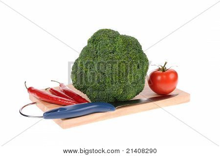 Brokolice Tomatto pepř a nůž na prkénku