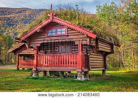 Camping cabins with turf roof near Hallingskarvet National Park in Norway.