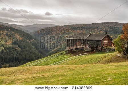 Typical norwegian farmhouse shed in autumn near Rondane National Park, Norway.