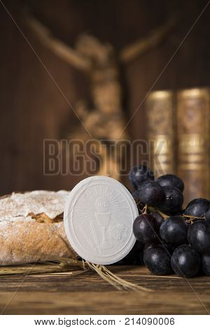 Eucharist symbol of bread and wine, chalice and host, First communion background