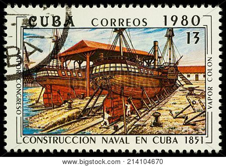 Moscow Russia - November 17 2017: A stamp printed in Cuba shows Construction of ships on Cuba (steamships 