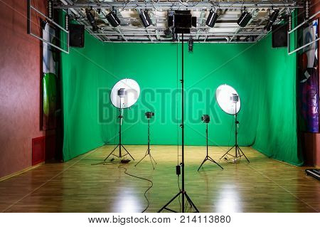 Studio for movies. Green screen. The chroma key. Lighting equipment in the pavilion. Show business