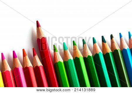 Leadership Concept With One Pencil Standing Out Of Crowd Of Other Pencils