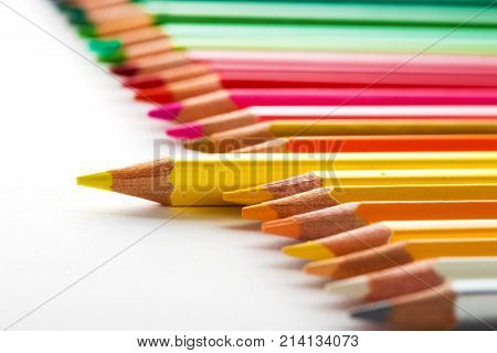 Leadership Concept With One Pencil Standing Out Of Crowd Of Other Pencils