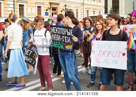 KYIV, UKRAINE - JUNE 18, 2017: Woman with agitative poster on gay pride outdoors