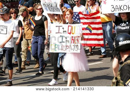 KYIV, UKRAINE - JUNE 18, 2017: Activists holding agitative posters on gay pride