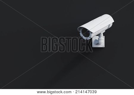White Cctv Camera On A Black Wall
