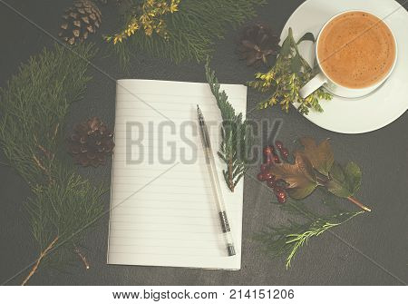 Christmas background or Xmas card with decorations fir gift box and ornamen. Space for Holiday Greetings. Top view. Goal planning winter holiday