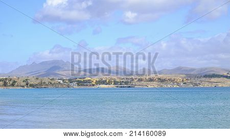 View on the beach in Costa Calma and blue ocean on the Canary Island Fuerteventura Spain.