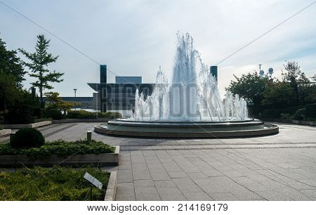 Fountain by Amalienborg palace in the city of Copenhagen in Denmark