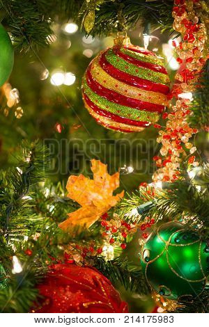 Multi Colorred Glitter Ball Ornament Hanging On Christmas Tree With Selective Focus