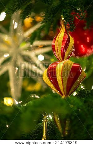 Multi-colored And Glitter Christmas Diamond Ornament Hang On Tree In Selective Focus