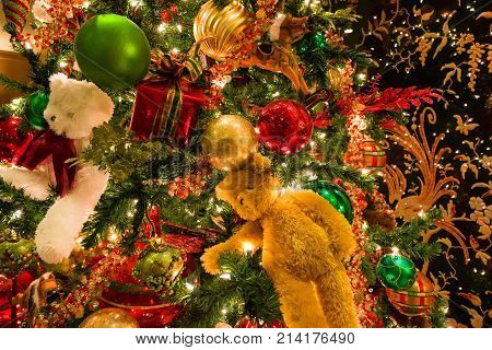 Christmas Texture. Colorful Ornaments Made Of Balls And Teddy Bears And Toys
