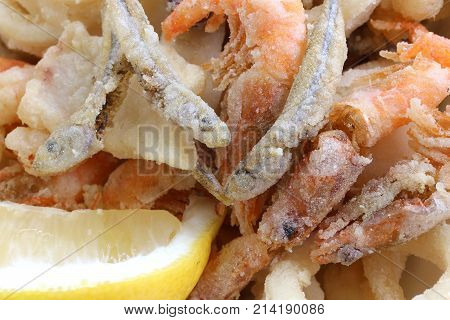 Fried Fish At The Takeaway Restaurant And A Lemon