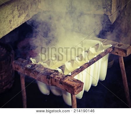 Making Cheese In A Cheese Factory With Vintage Effect