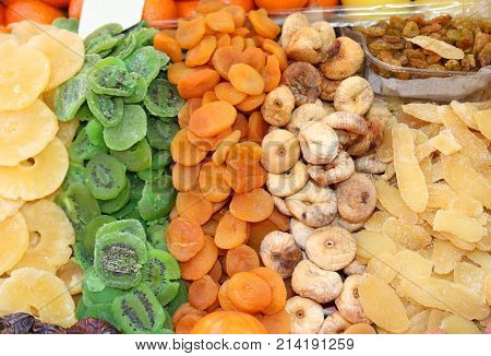 Background Of Many Dried Fruits With Kiwi Figs Pineapple Apricot