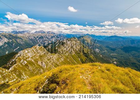 On The Summit Of An Alpine Peak
