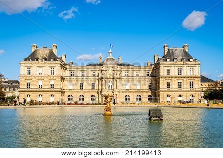 Paris France - October 20 2017: View of south facade of Luxembourg Palace. Palace was built in 1615-1645 to be royal residence of the regent Marie de Médicis mother of Louis XIII of France. Unidentified people present on picture. Copy space in blue sky.