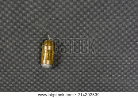 Basket For Groundbait With A Weight.