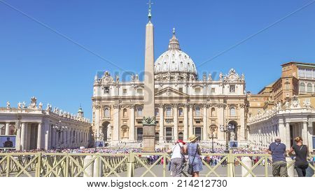 Rome, Lazio, Italy - June 18, 2016: Pope Francesco meeting pilgrim in San Pietro Italian square front of Saint Peter church of Rome. Pope Francesco is speaking to crowd for jubilee.