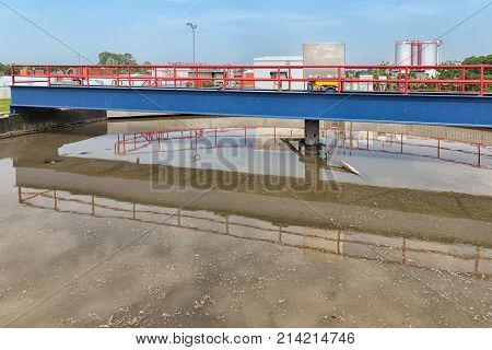 Dirty water in sedimentation tank of sewage treatment plant. In the first sedimentation tank is the primary clarification of the wastewater treatment process